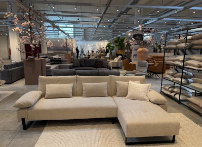 Large furniture showroom with a sectional sofa