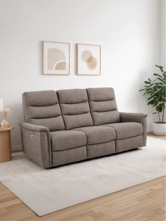 Light grey two-seater sofa in a styled living room