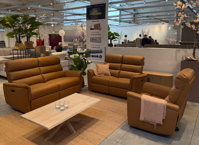 Forma showroom with a tan leather sofa set and coffee table