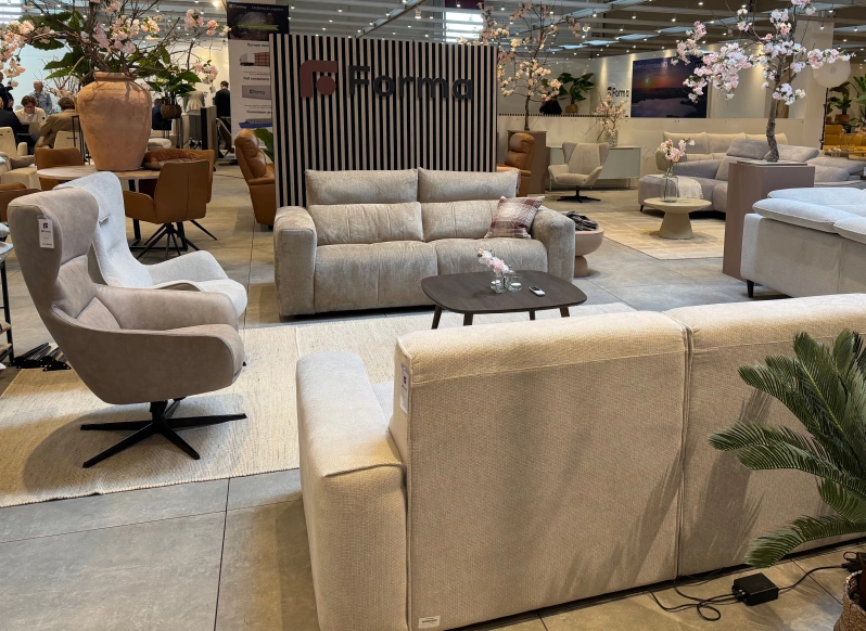 Forma furniture showroom with a grey armchair and sofas